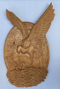 Wooden relief painting – eagle with spread wings, oval panel